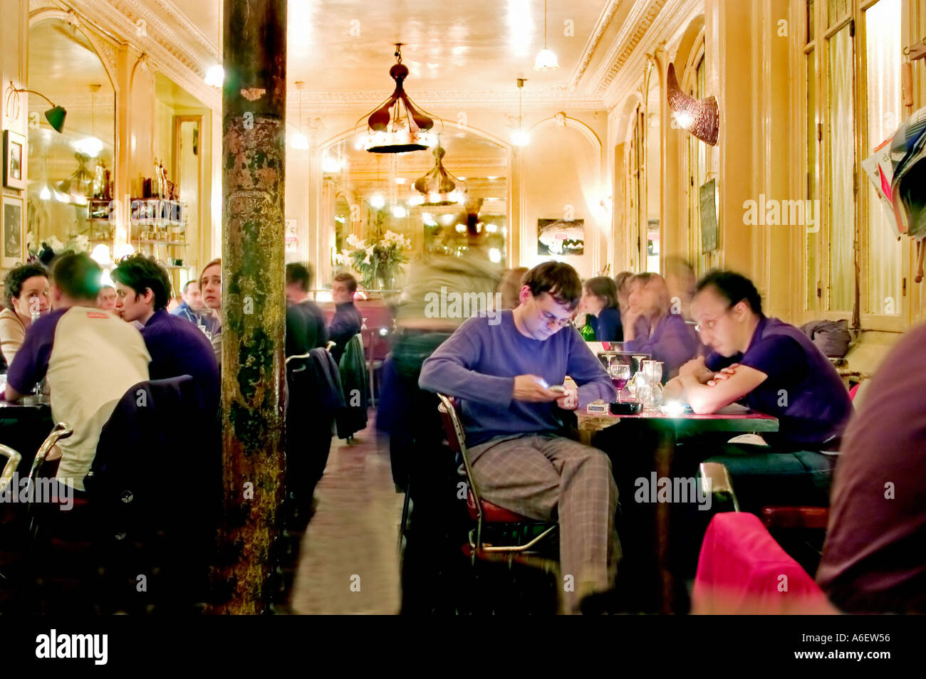 Paris, France, Crowd Young people Sharing Drinks, at tables, Interior Cafe Bar  Bistro Restaurant, 'Le Cannibale' Paris coffee shop old Stock Photo