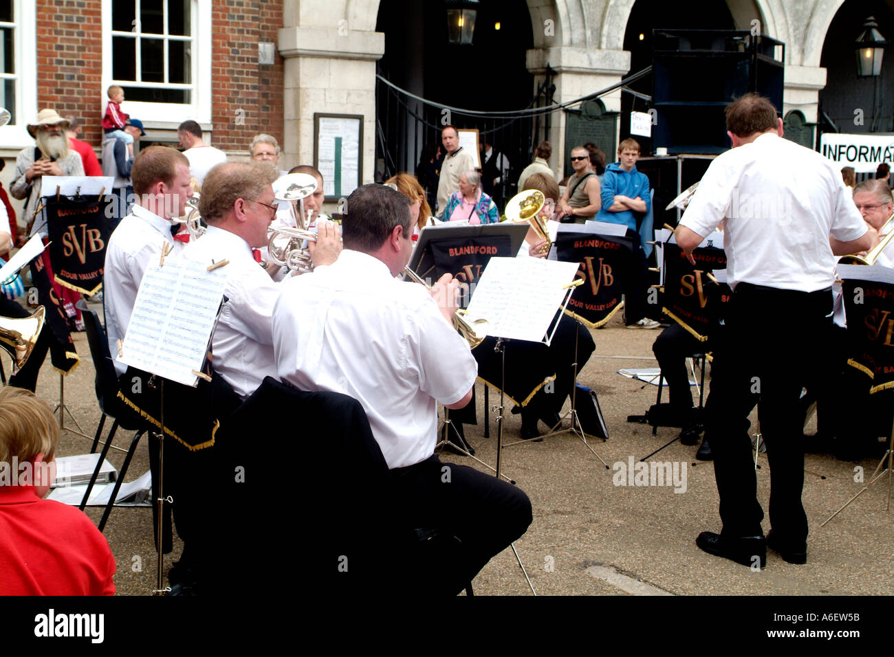 A British Brass band plays at a weekend open air concert Stock Photo
