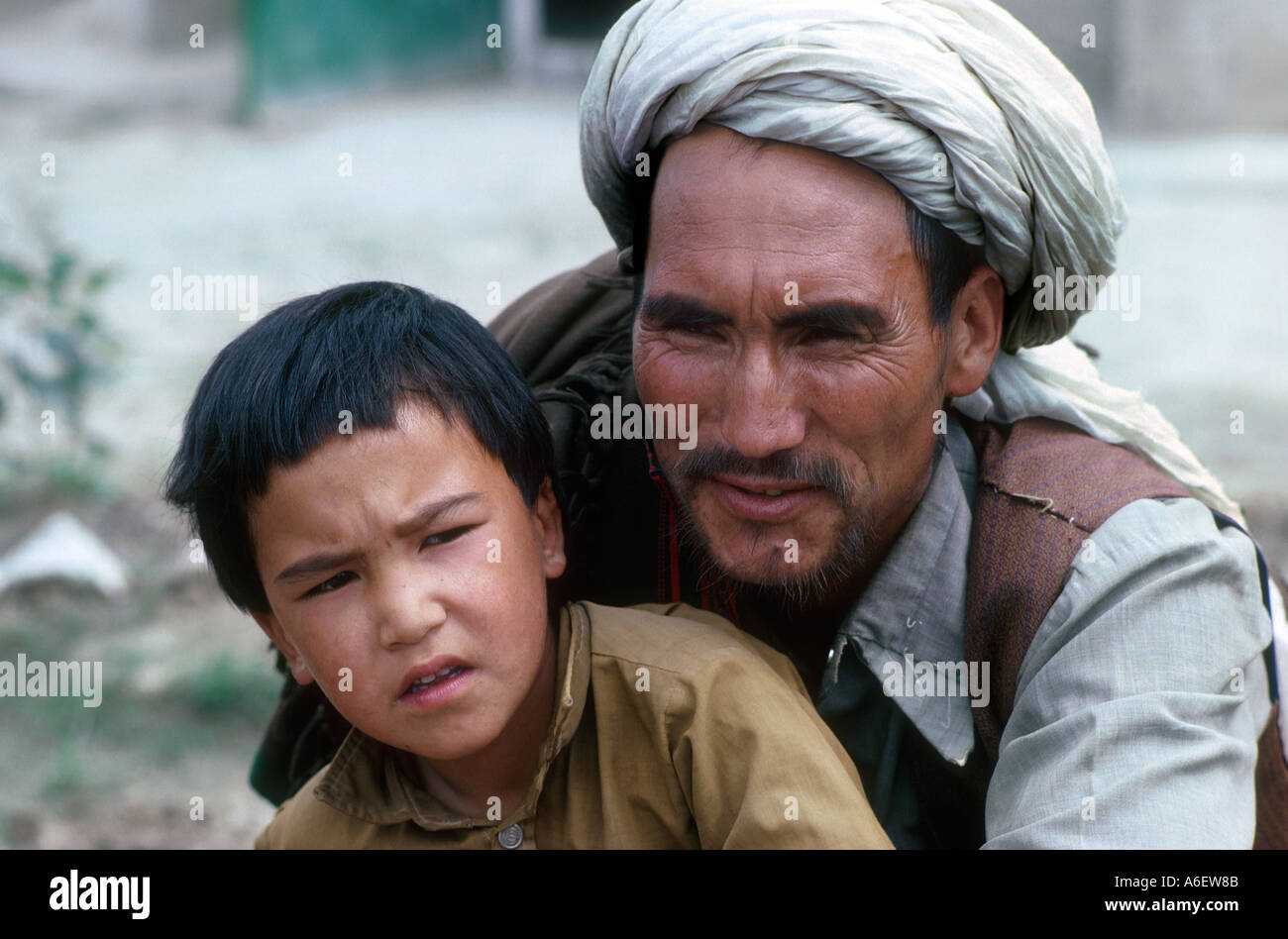 Afghan father and son refugees. Peshawar, Pakistan Stock Photo