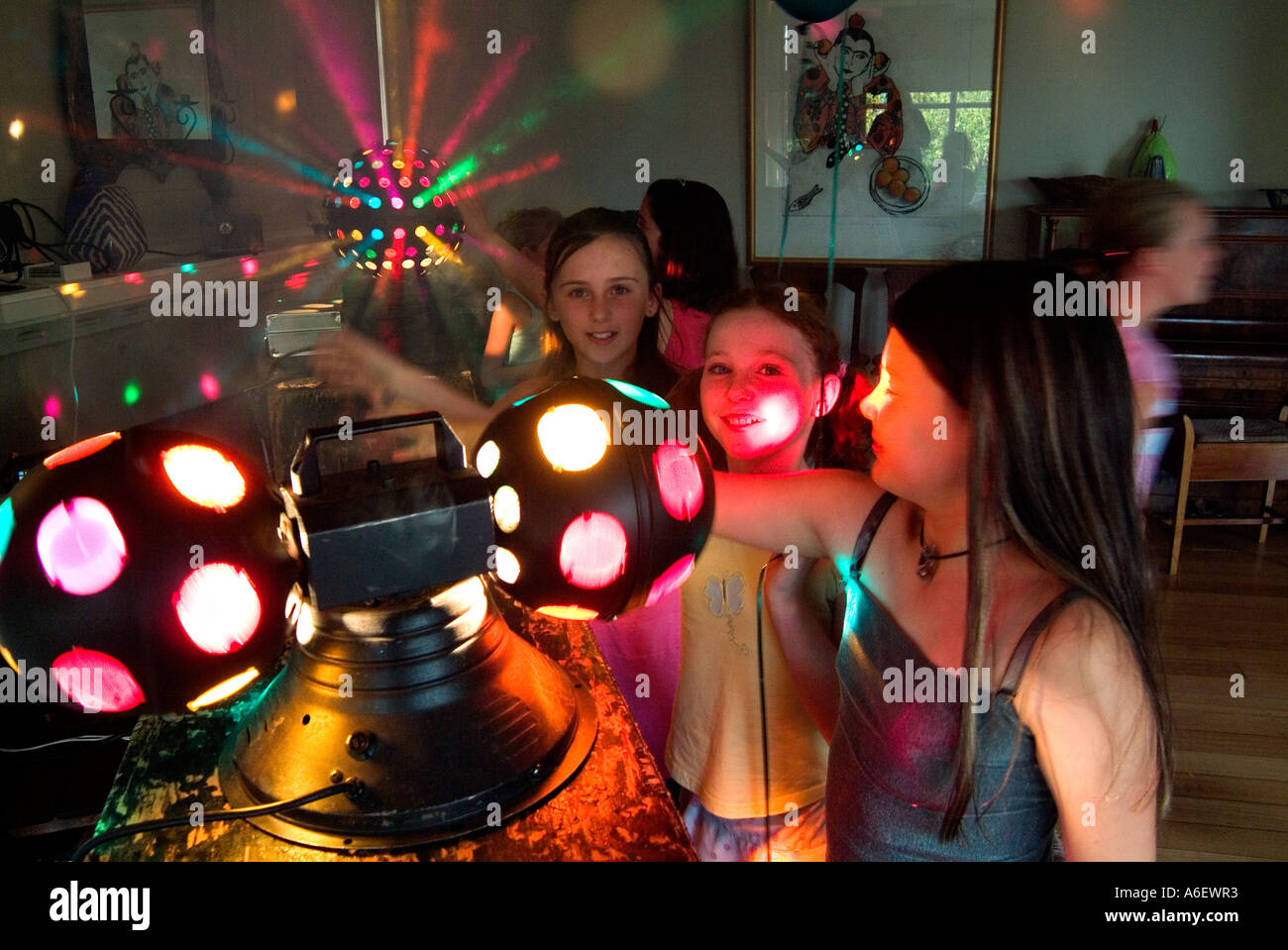 9 year old girls at disco birthday party Stock Photo