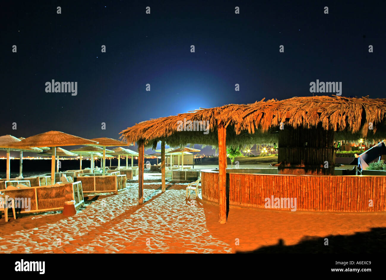 Beach umbrella loungers and bar Stock Photo Alamy