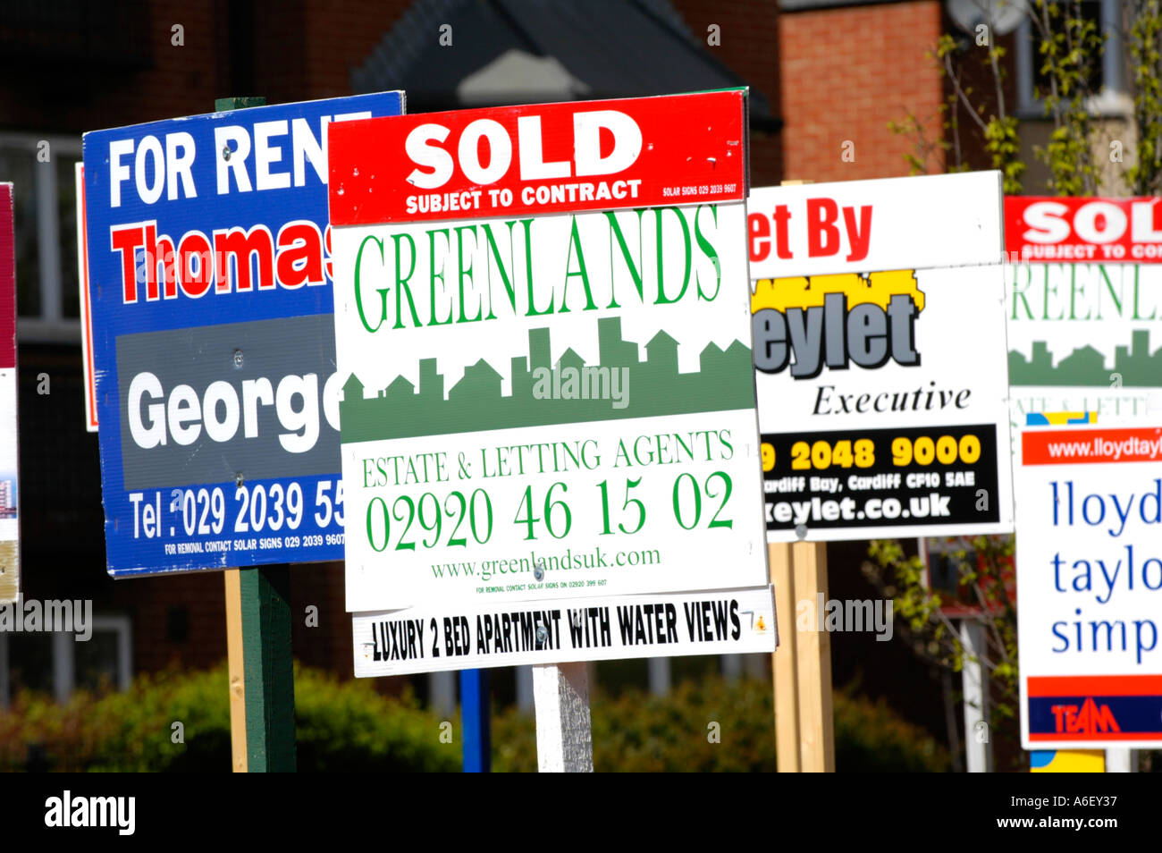 FOR SALE, SOLD, TO LET, LET BY, signs in Cardiff Bay, South Wales, UK