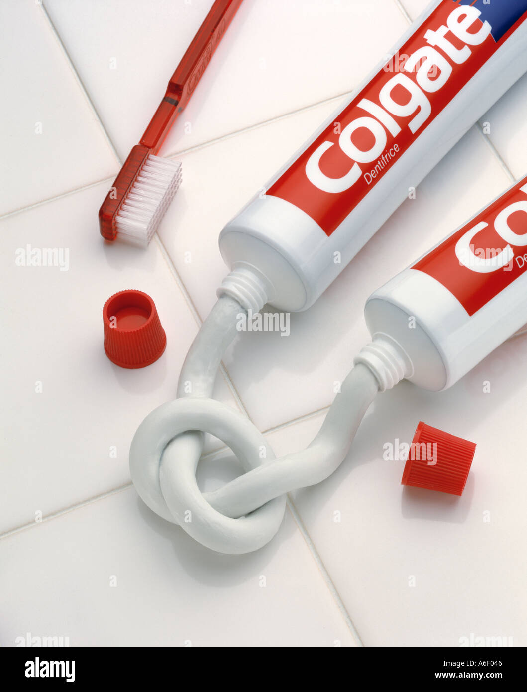 Toothpaste tied in knot Stock Photo - Alamy