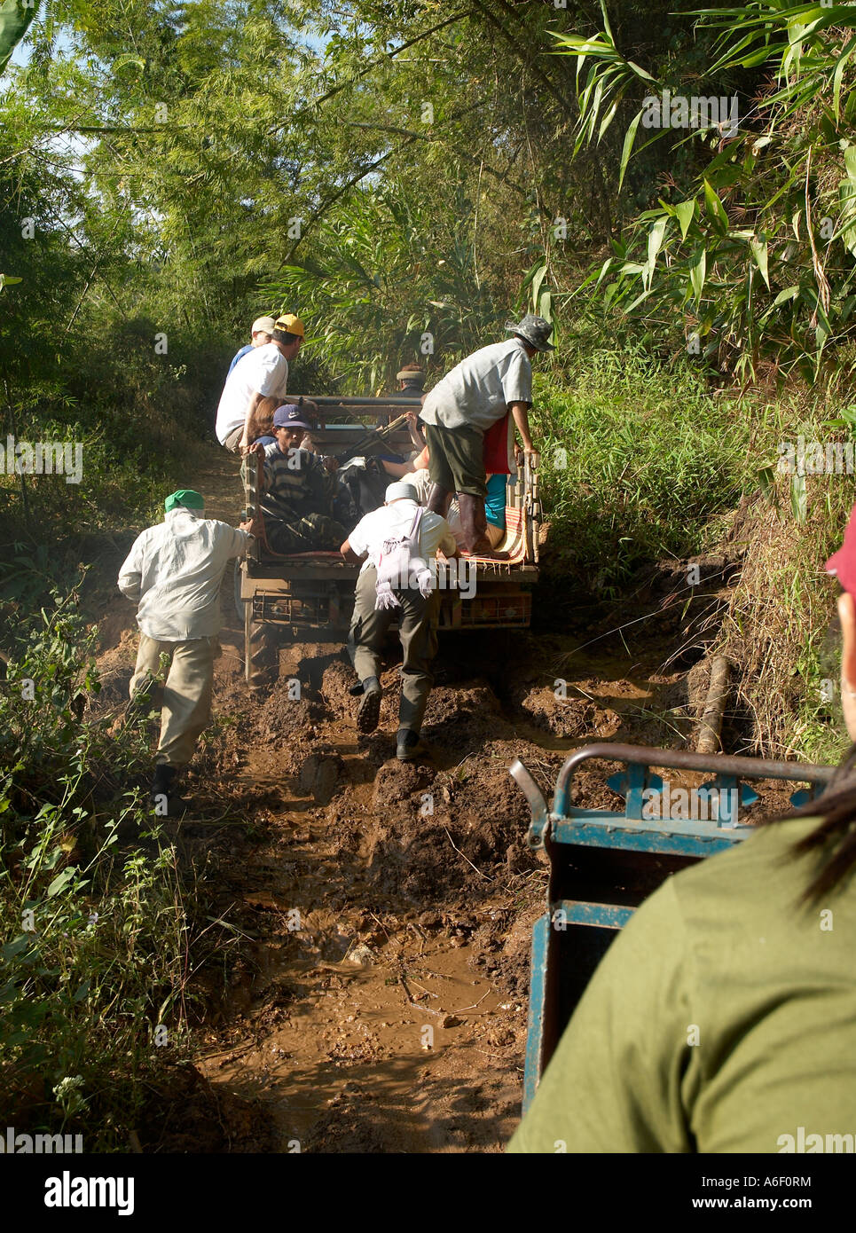 Pushing truck out of mud in Northern Thailand Stock Photo Alamy