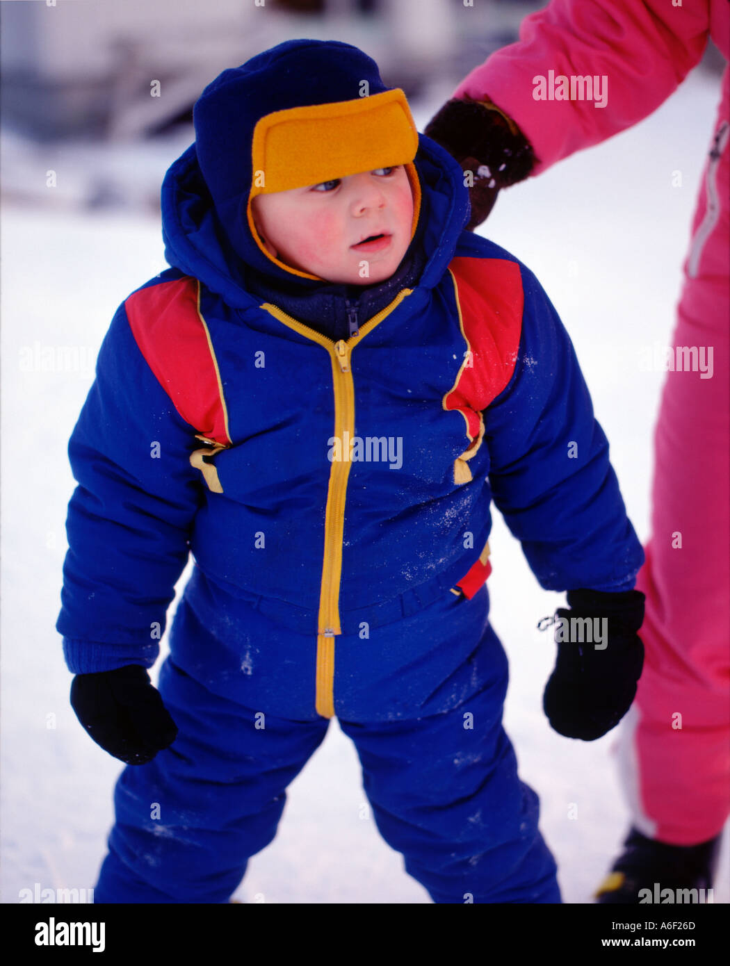 Three Year Old boy learns to ski with his mother Stock Photo Alamy