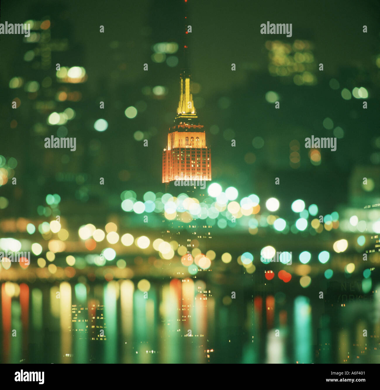 Empire State Building at night in New York City abstract Stock Photo ...