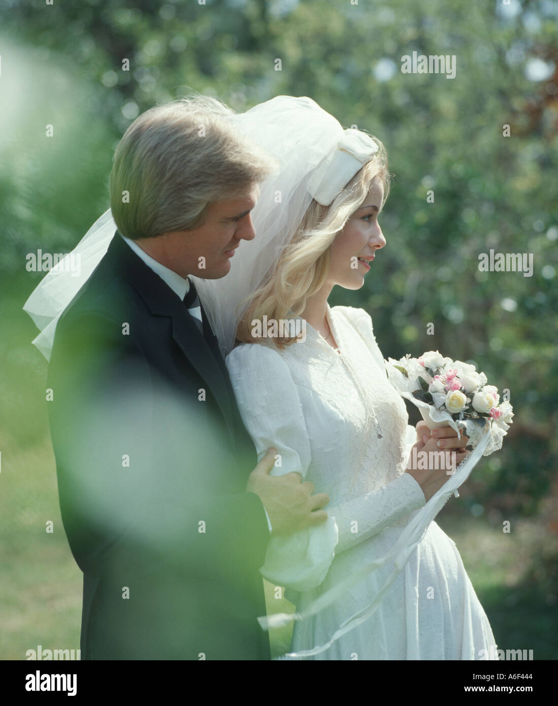 Bride and groom after wedding outdoors Stock Photo