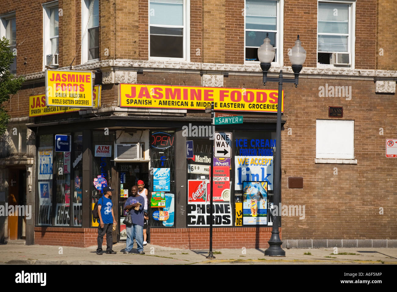CHICAGO Illinois Three adult men leave corner grocery store in Albany
