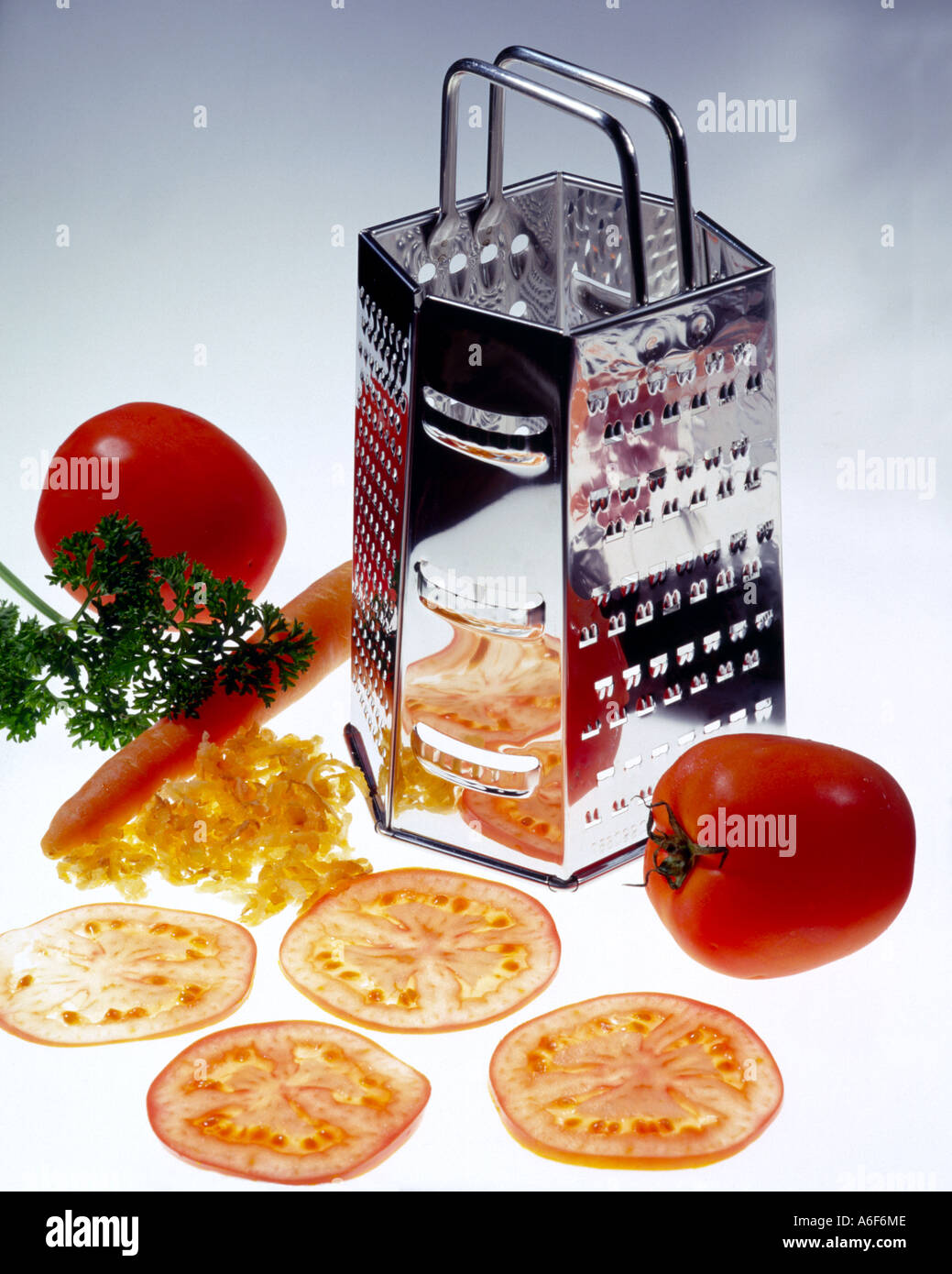 Tomatoes and Grater Stock Photo Alamy