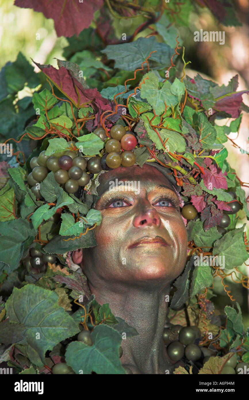 Beautiful lady disguised as a grape vine, Animal Kingdom, Disney World, Orlando, Florida, USA Stock Photo