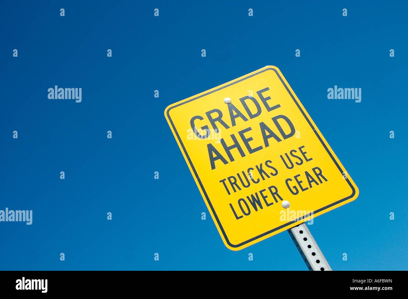 Steep Grade Ahead highway traffic sign Stock Photo - Alamy