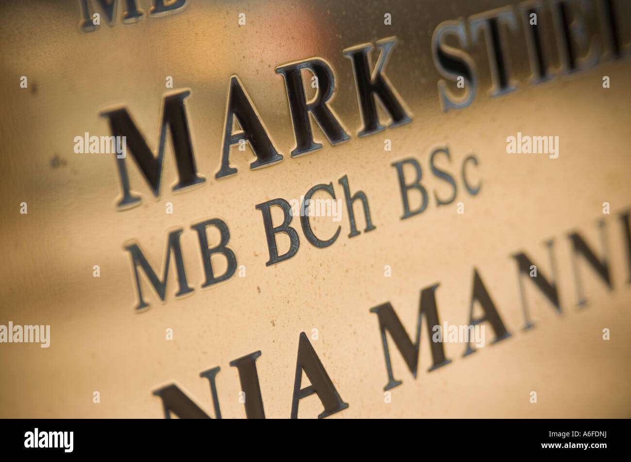 brass name plate on doctors surgery aberystwyth wales UK Stock Photo