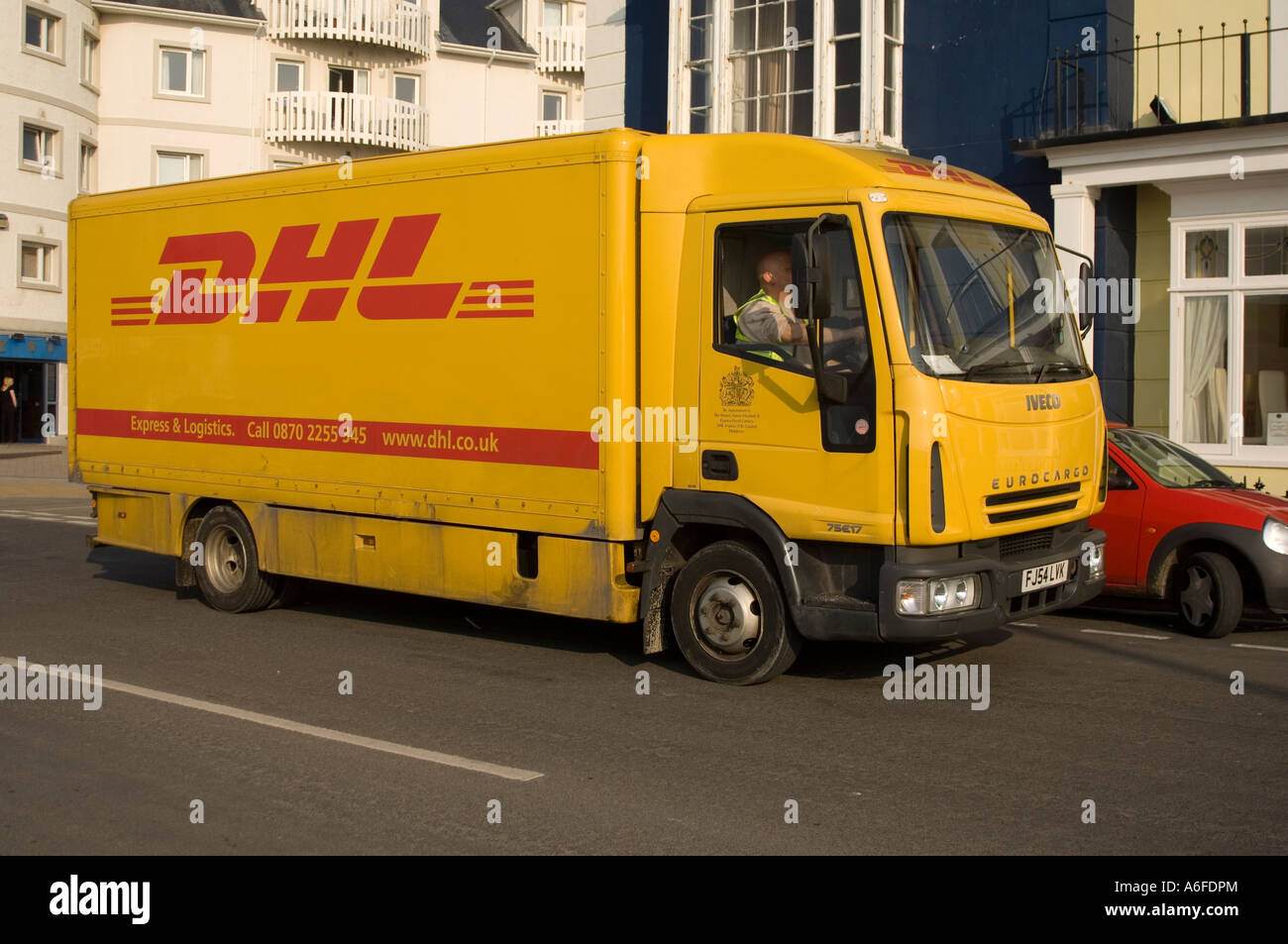 yellow DHL courier van truck lorry aberystwyth wales UK Stock Photo Alamy