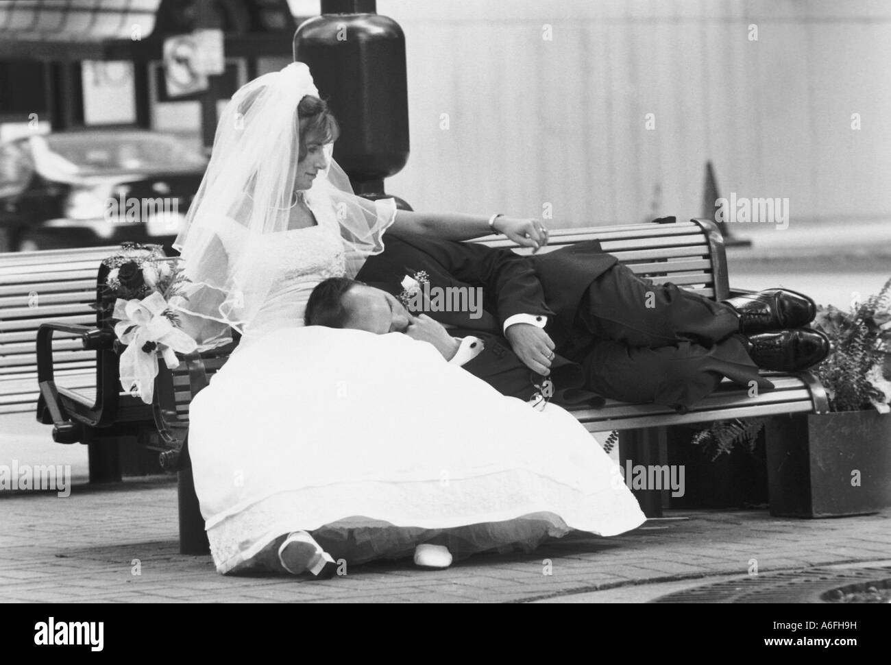 Tired newly weds Stock Photo