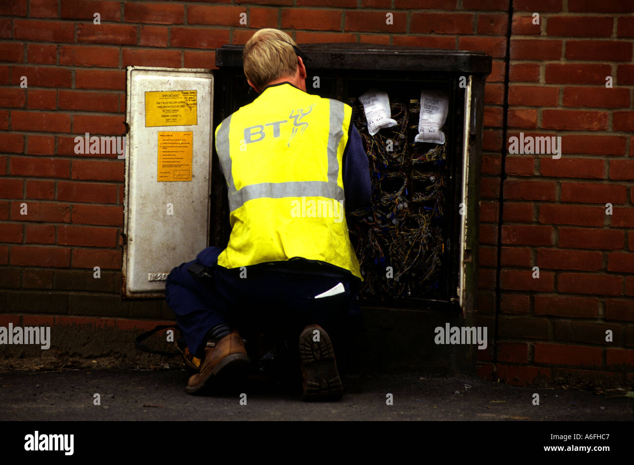 British engineer at work on a telephone juction box, Alderton