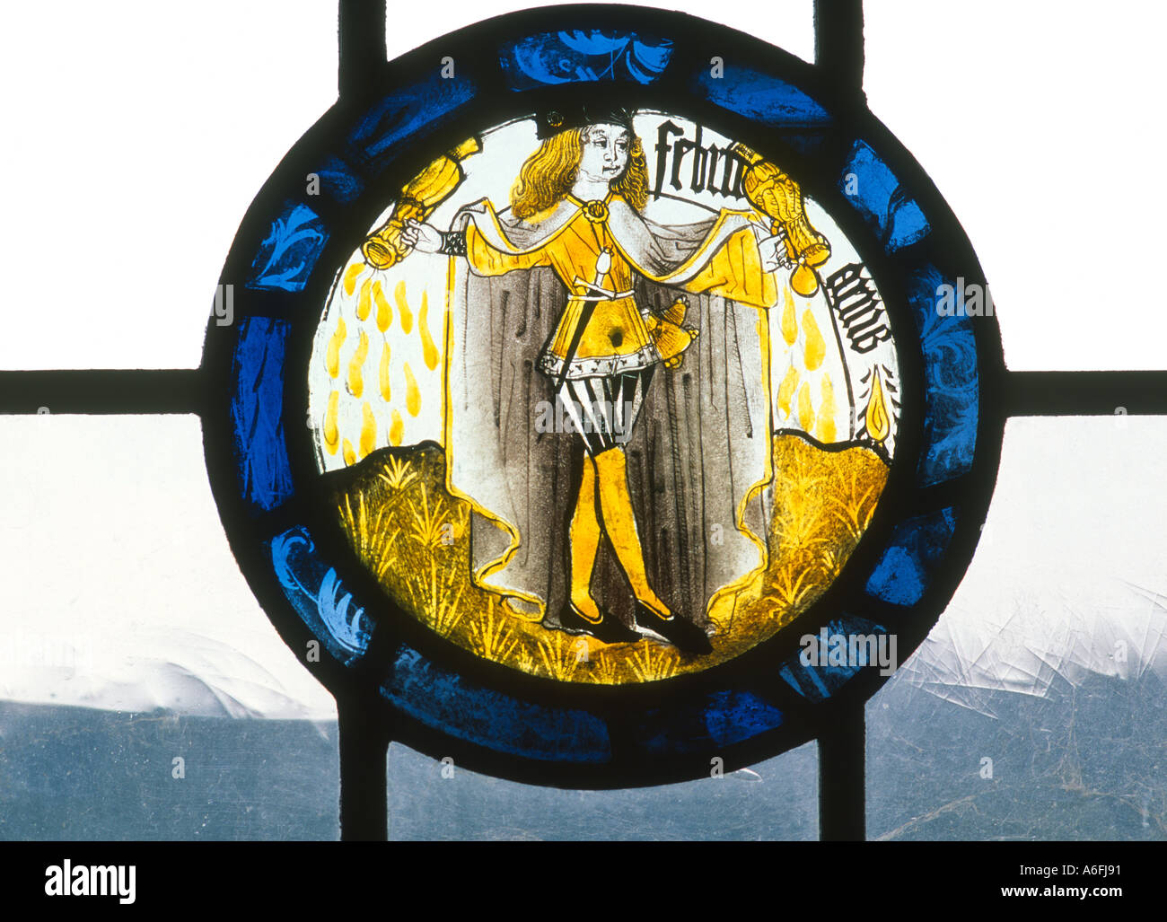 Medieval Stained Glass Roundel Audley End Aquarius water carrier February 15th century art history heritage costume medieval Stock Photo