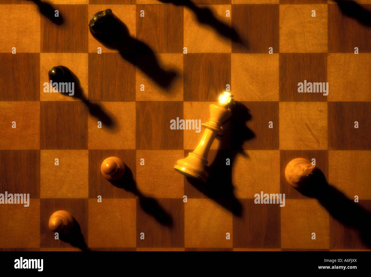 Chess king turned over in defeat Strategy Stock Photo Alamy