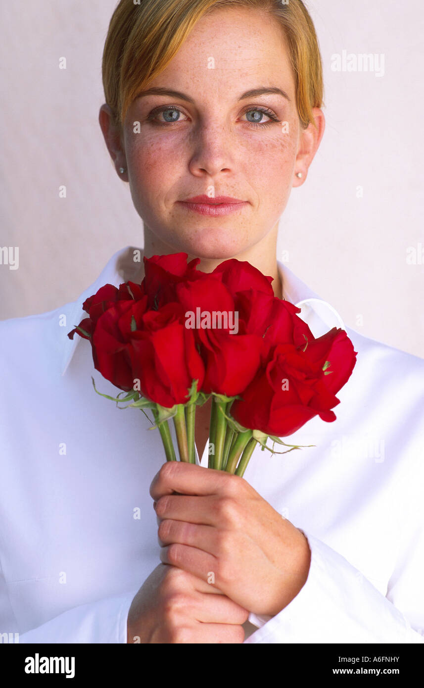 Woman with red roses Stock Photo