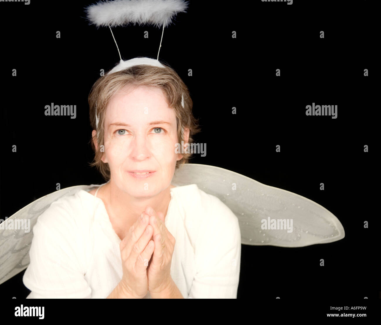 Woman dressed as an angel Stock Photo - Alamy