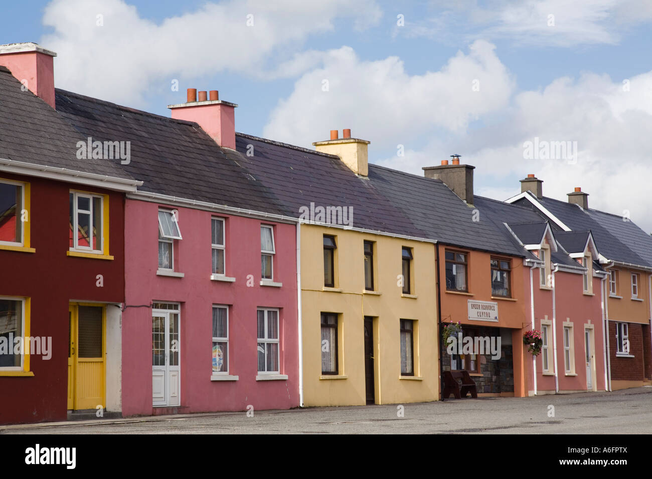Sneem Ireland Row of traditional colourful painted houses in North Square on 'Ring of Kerry' route on Iveragh Peninsula Stock Photo