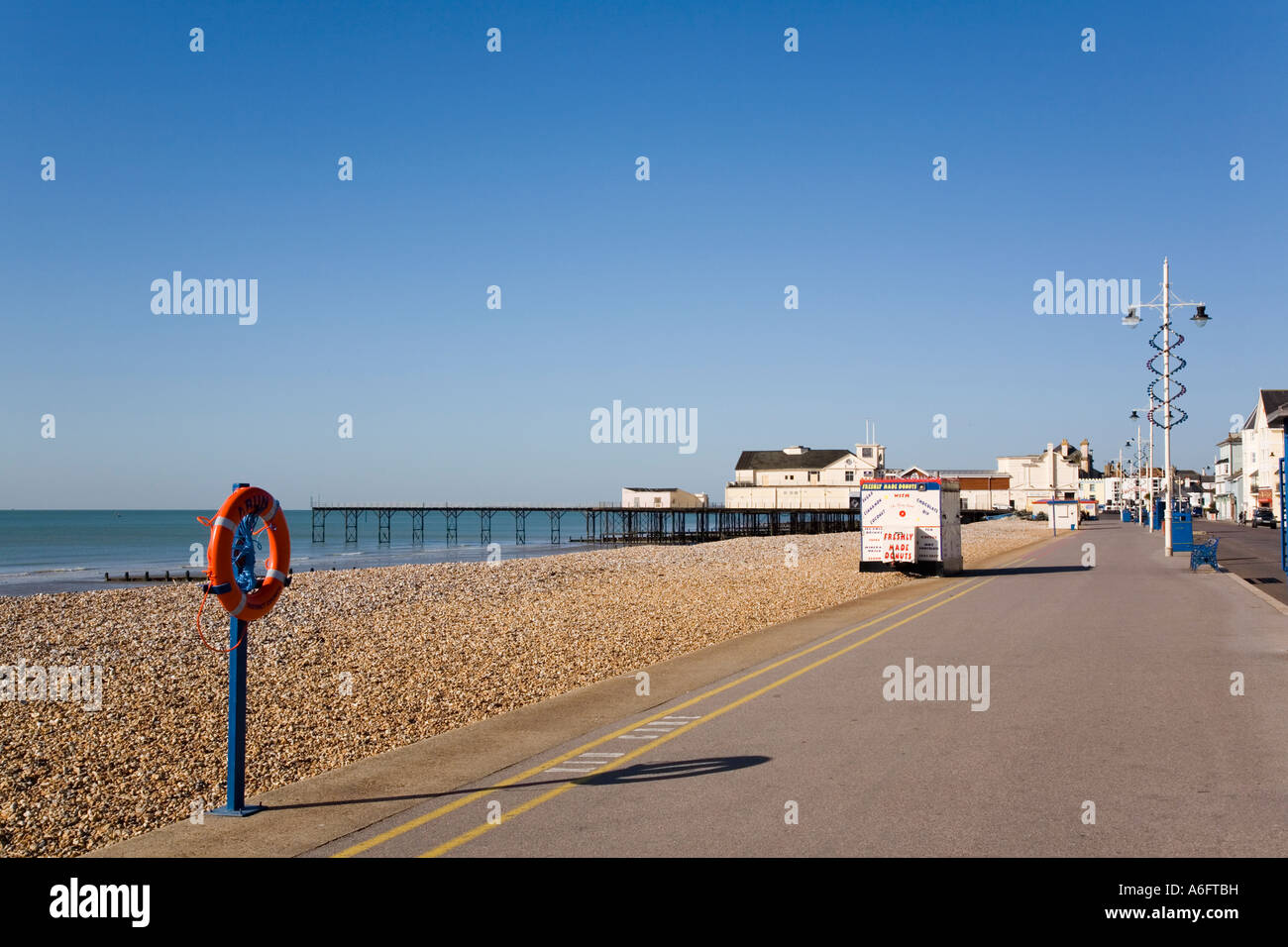 Seafront promenade empty beach and pier in Bognor Regis West Sussex England UK Britain Stock Photo