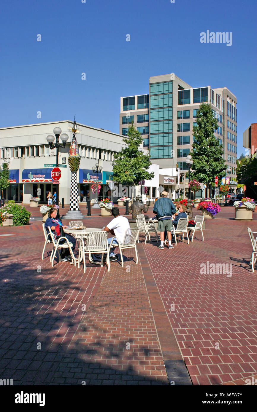 People relaxing at Kesey Square downtown Eugene Oregon Stock Photo - Alamy