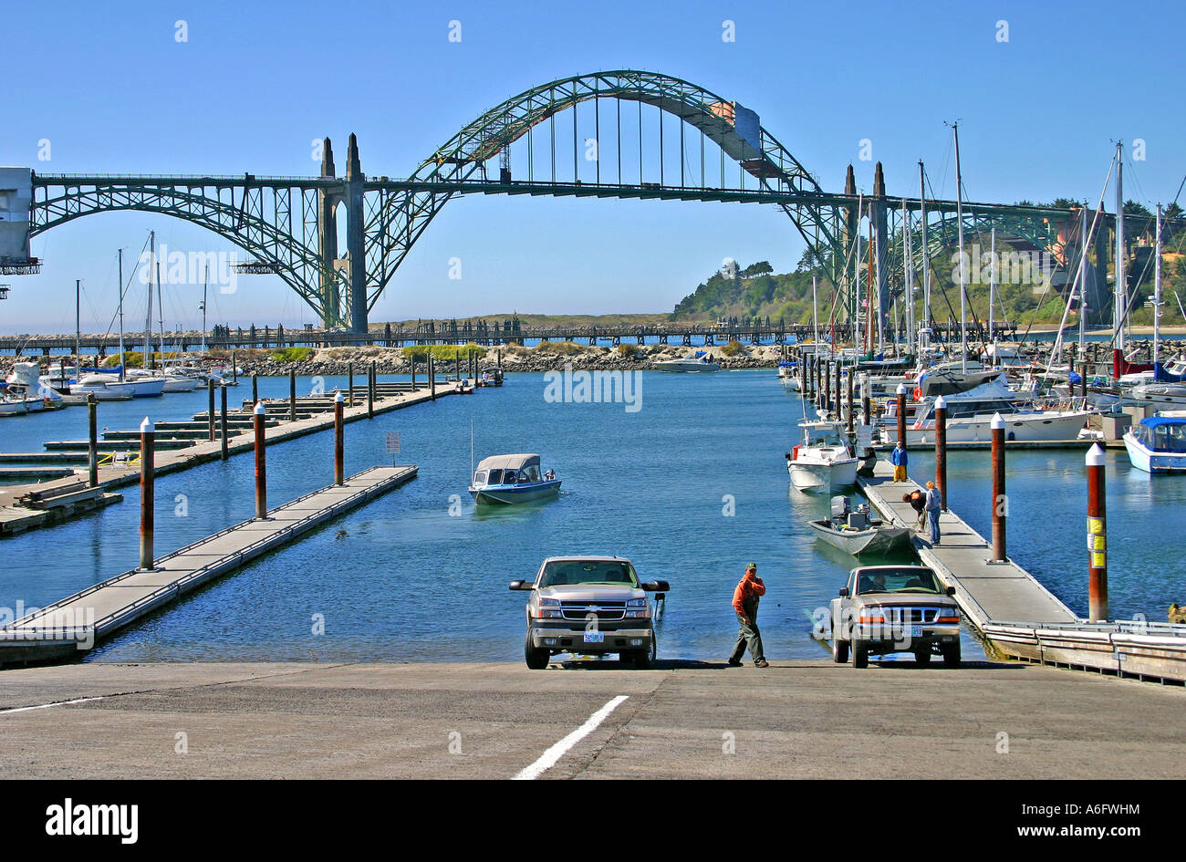 Boaters at boat launch ramp on Yaquina Bay Newport Oregon Stock Photo
