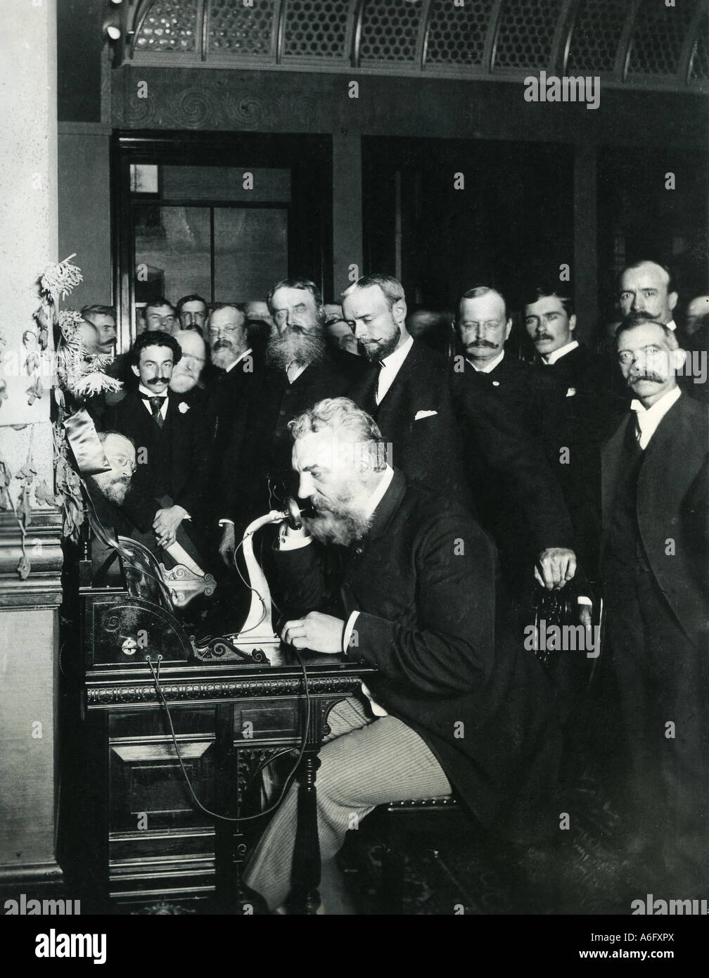 ALEXANDER GRAHAM BELL in New York in 1892 demonstrating making a telephone call to Chicago Stock Photo