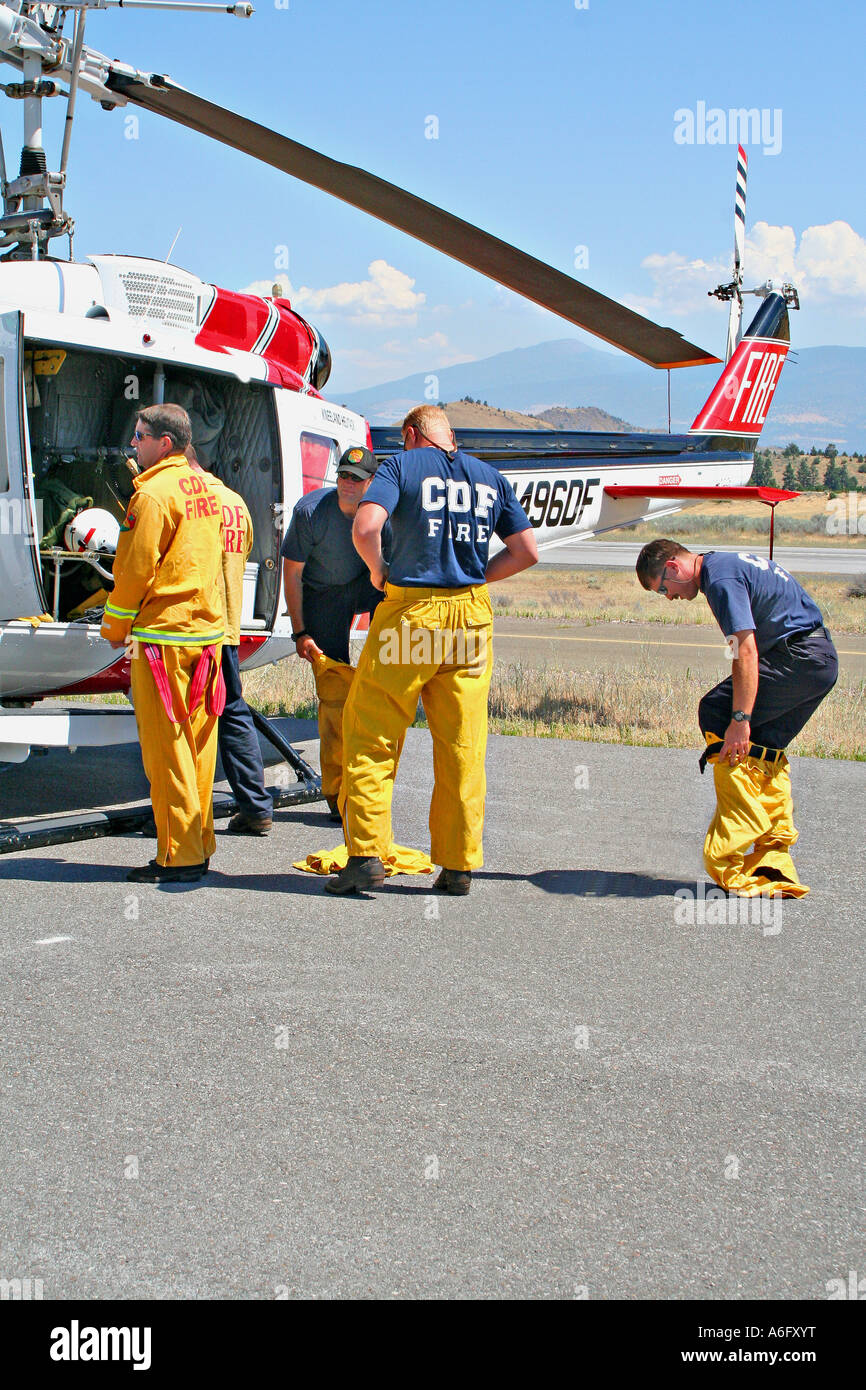 California Department of Forestry firefighters suit up prepare to lift off Weed California Stock Photo