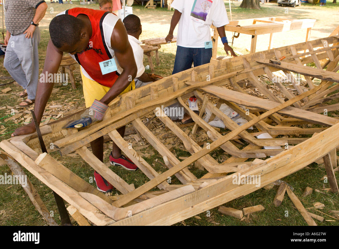 Boat builder Jean Gesner Elian from Luly on the southern coast of Haiti constructs boat by hand Smithsonian Folklife Festival Stock Photo