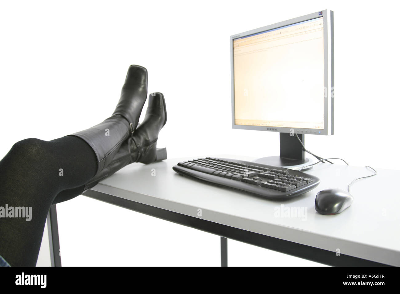 computer workstation with boots during a break Stock Photo Alamy