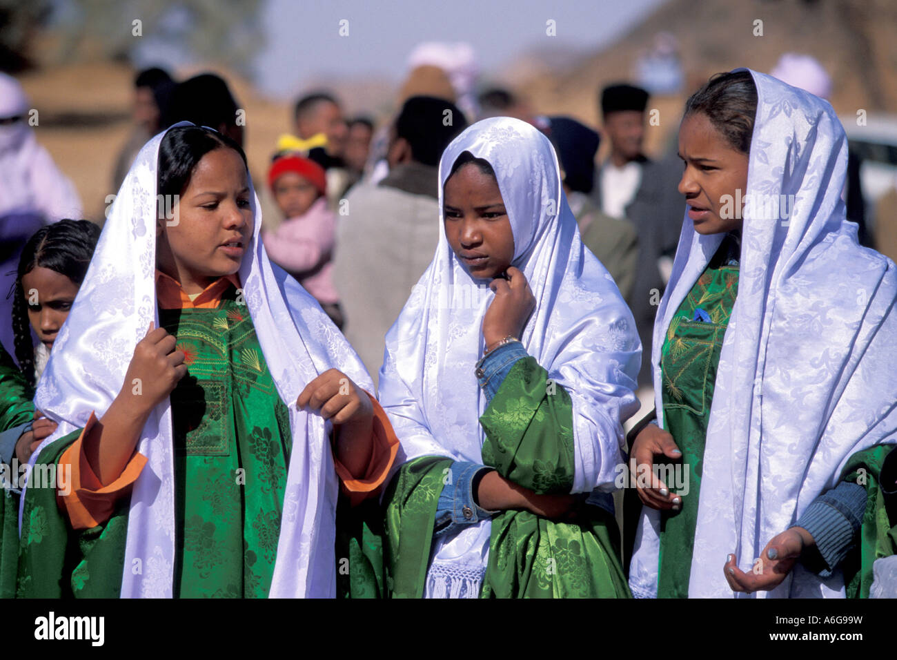 young Tuareg girls in traditional clothing at the festival of Ghat, Libya Stock Photo