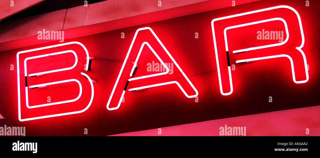 Neon Bar Sign glowing above pub Stock Photo Alamy