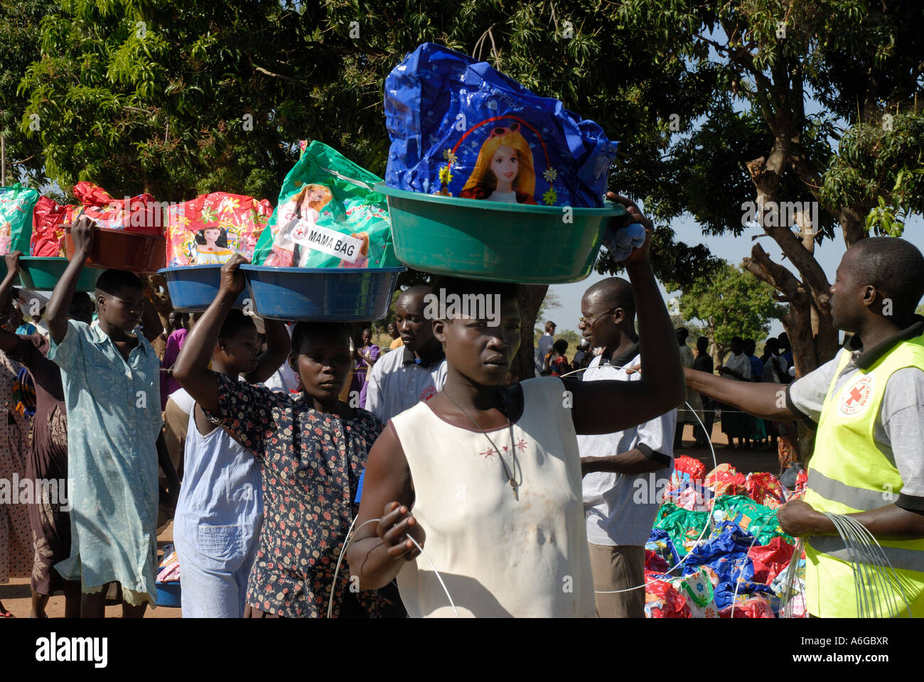 Lira.Uganda. Women collect mama bags containing  materials for new mothers. Stock Photo