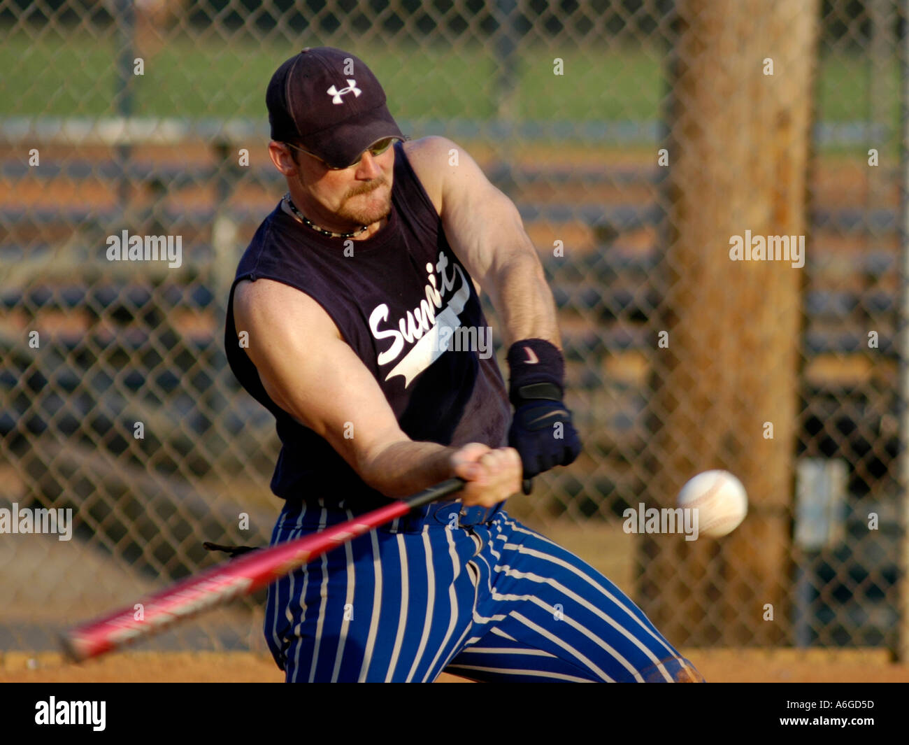 Mens fast pitch softball league for those under 35 Stock Photo Alamy