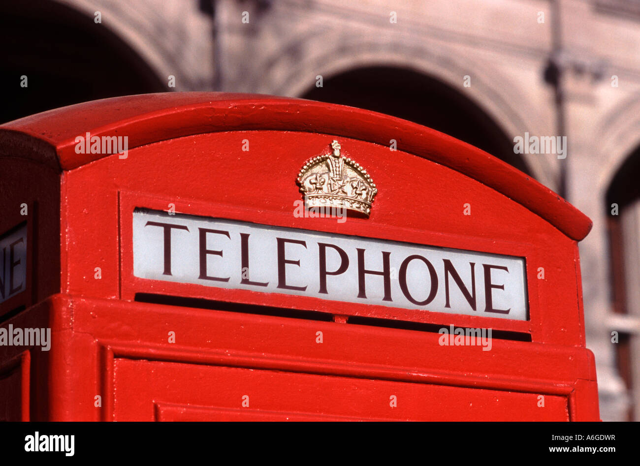 Curved top of a classic red British telephone box (K6 model), London, England Stock Photo