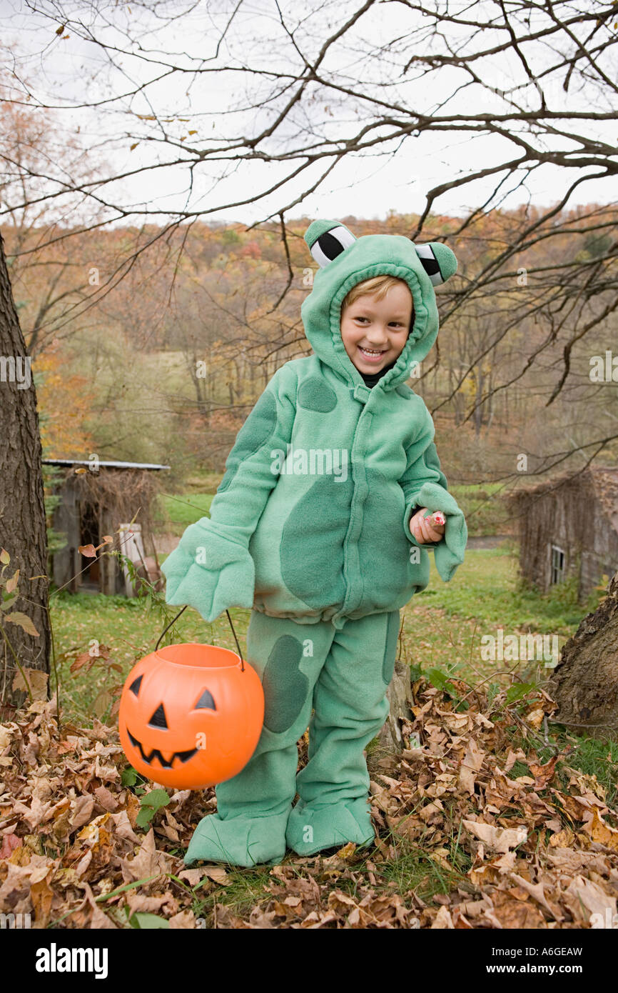 Boy in a frog costume Stock Photo Alamy