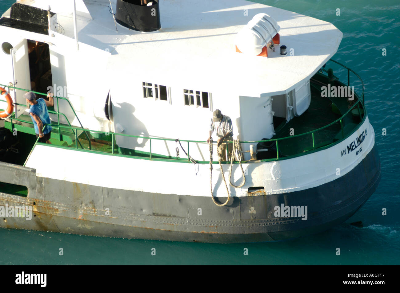 Small inter island cargo boat coming into Barbados to unload cargo Stock  Photo - Alamy