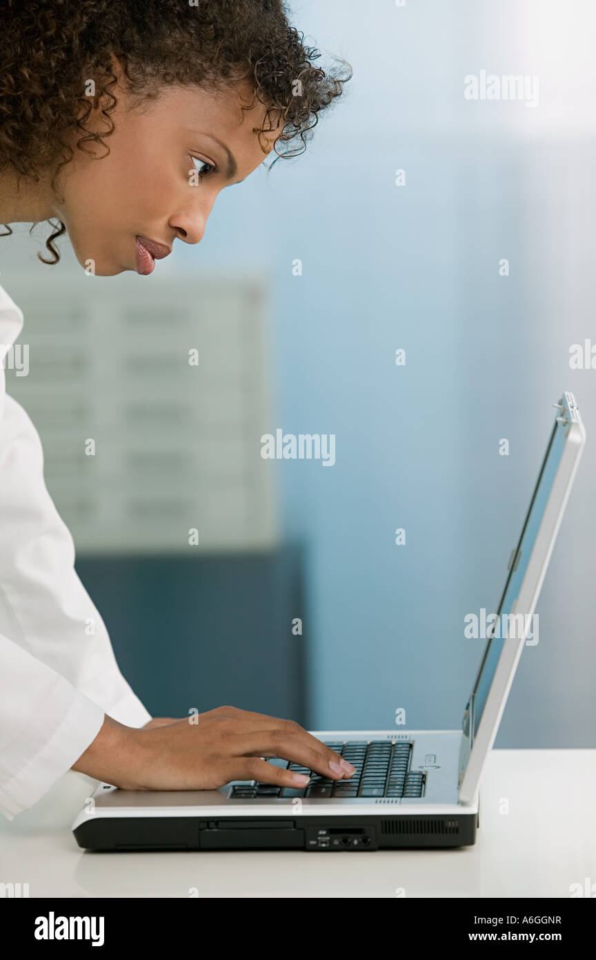 Doctor using laptop Stock Photo