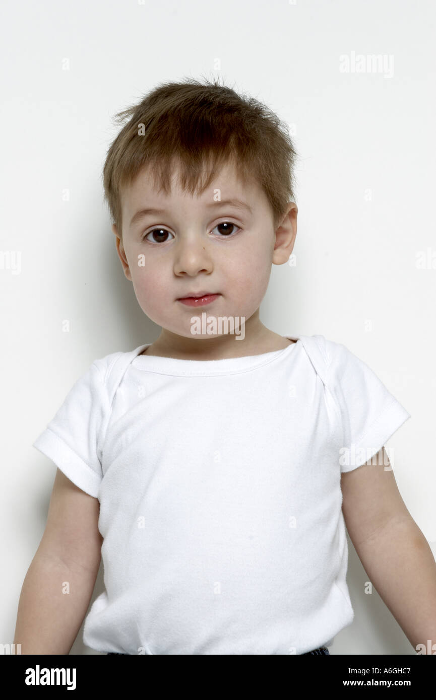 Young boy in white vest Stock Photo Alamy