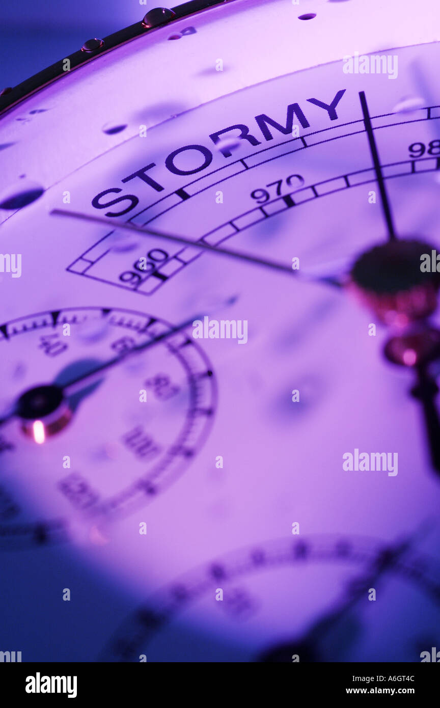 Barometer indicating stormy weather with water droplets on face Stock
