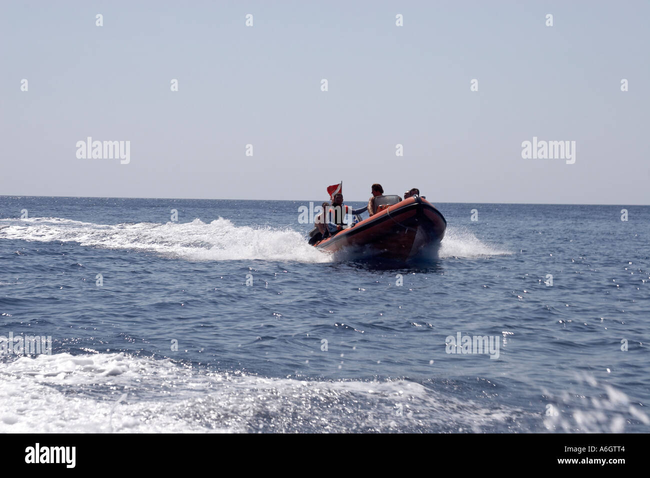 Inflatable rib speedboat with divers on the Aegean see Greek Island of ...