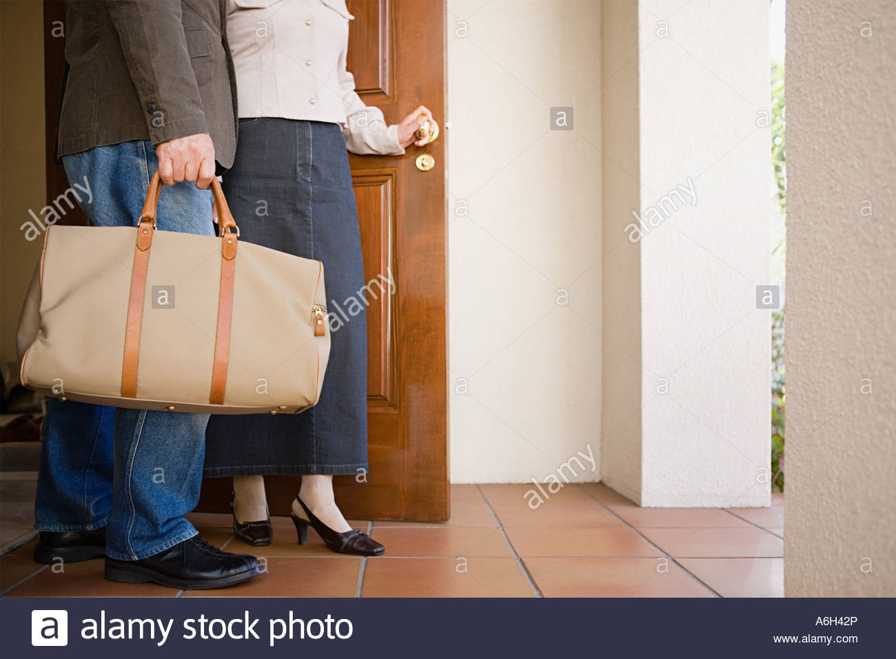 Man Leaving House Door Stock Photos & Man Leaving House Door Stock