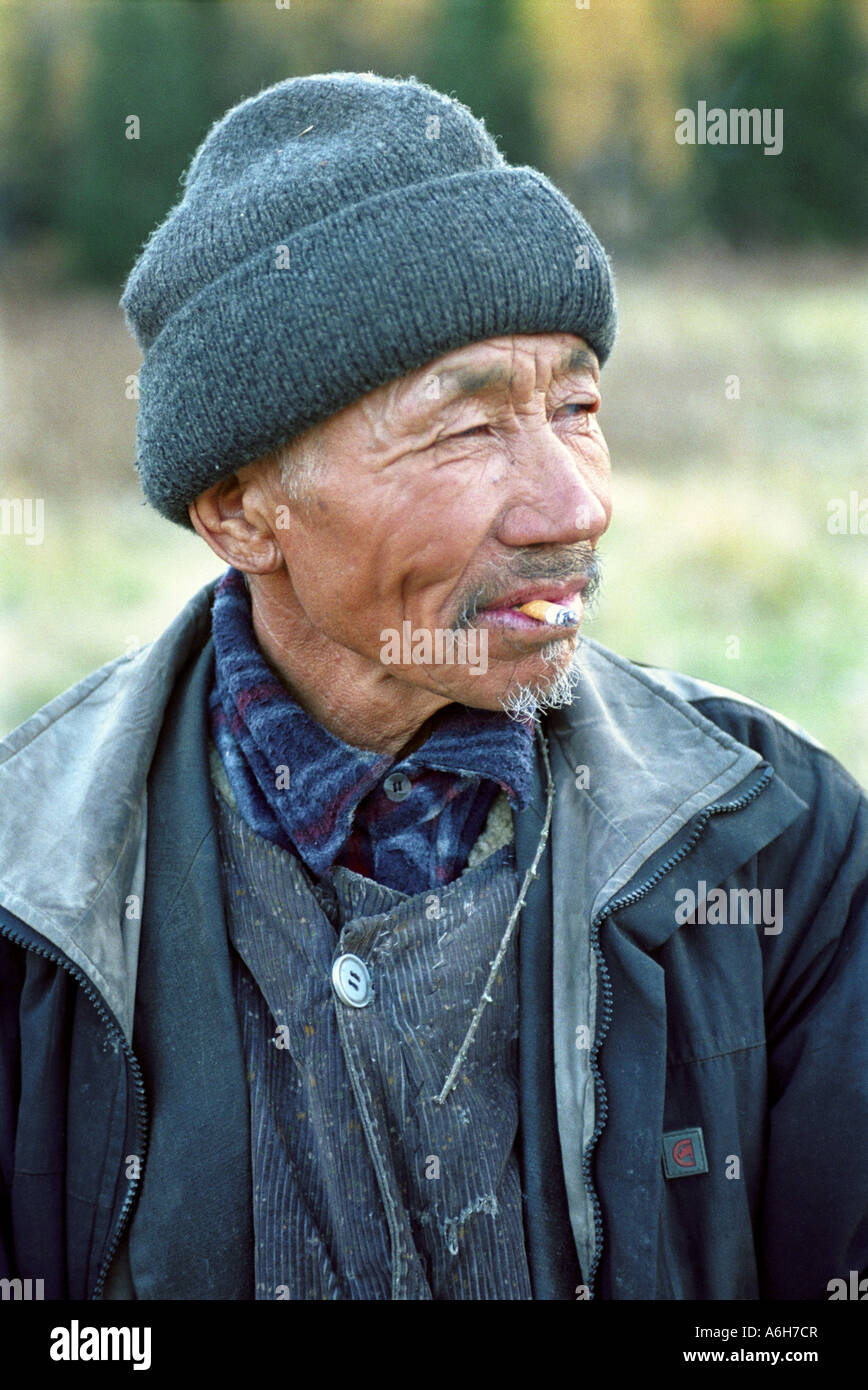 Portrait of a woodcutter from Adyr-Kezhig village. Azas (Todja) lake. The Sayan Mountains. The Tyva (Tuva) Republic. Russia Stock Photo