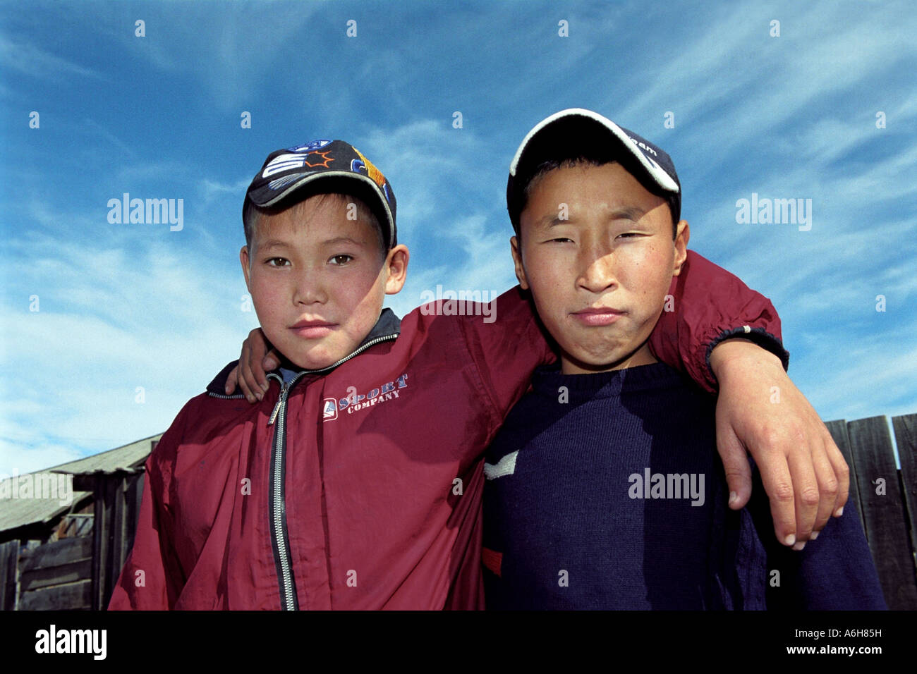Portrait of 2 (two) teenagers. Toora-Khem village. The Tyva (Tuva) Republic. Russia Stock Photo
