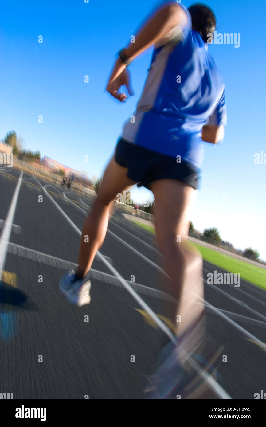 male running on running track outdoors Stock Photo - Alamy