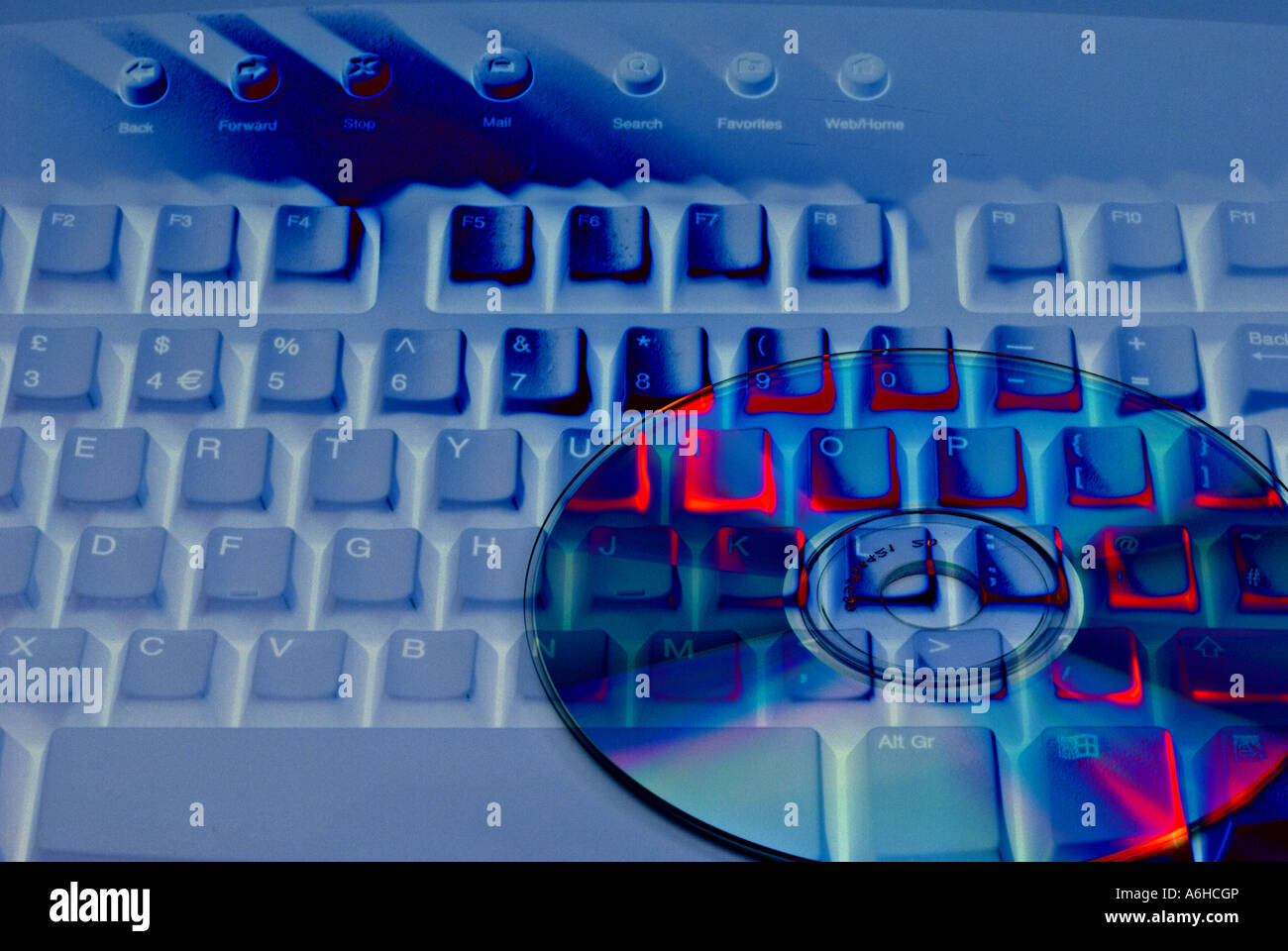 Computer keyboard and cd Digital Art Stock Photo