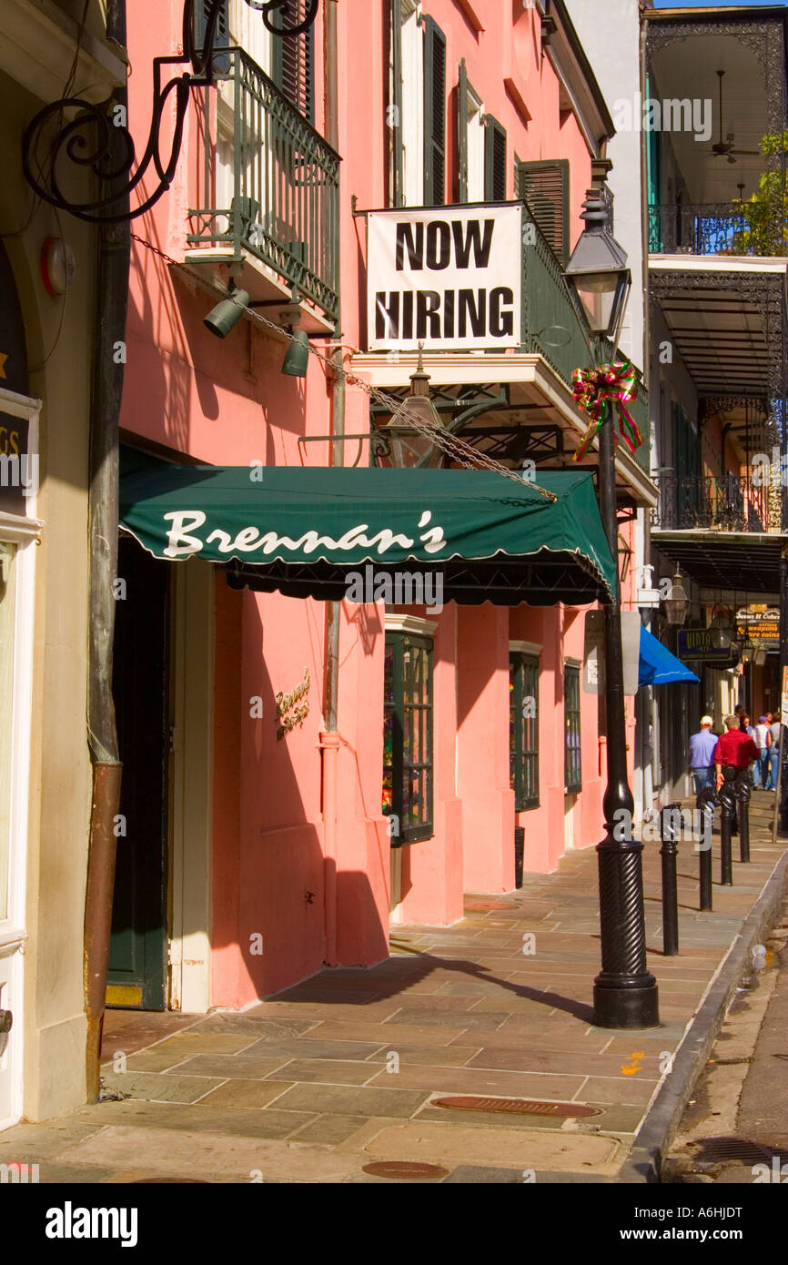 Brennan's restaurant entrance Now hiring sign Stock Photo