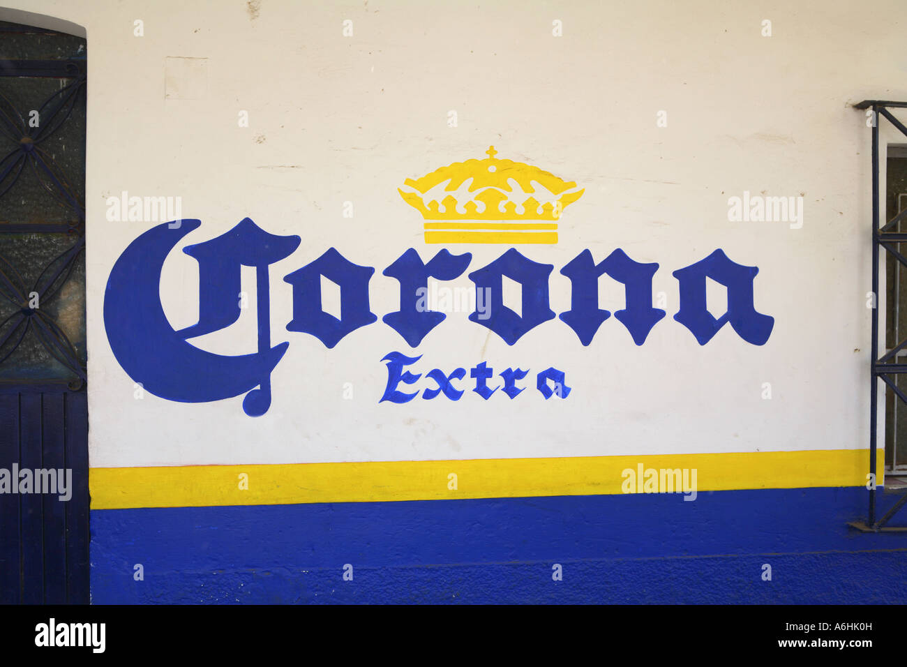 Corona advertisement painted on the wall of a small store Mexico Stock Photo