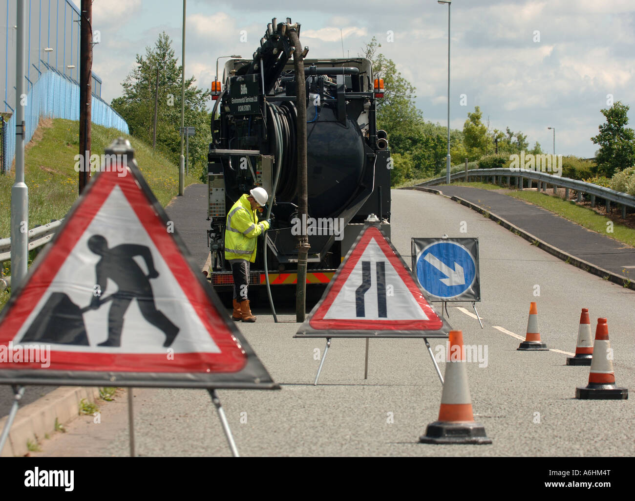 roadworks on a street in England Stock Photo - Alamy